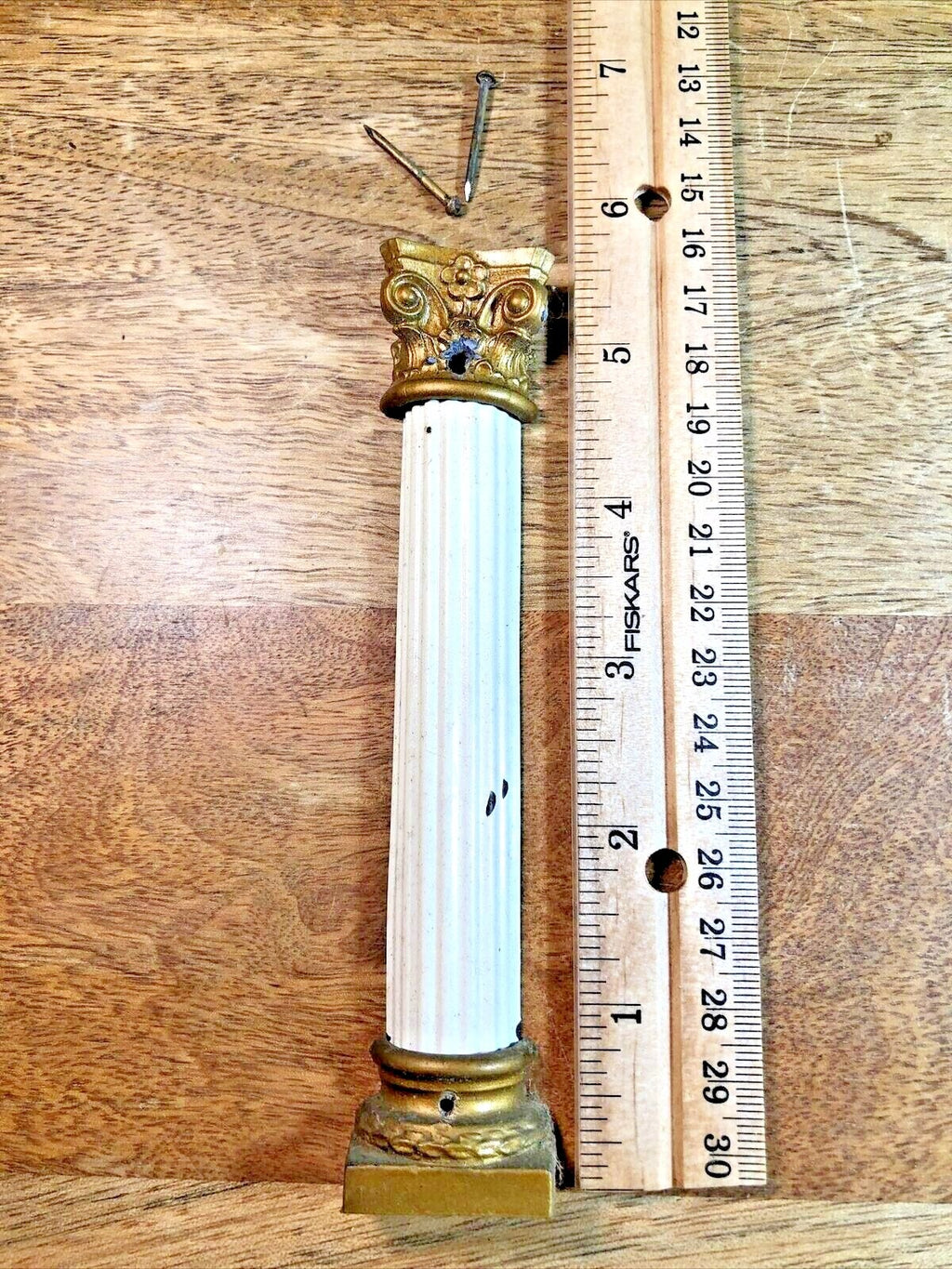 Old Black Mantel Clock Column 5 1/2 Inches Tall               (K7371)