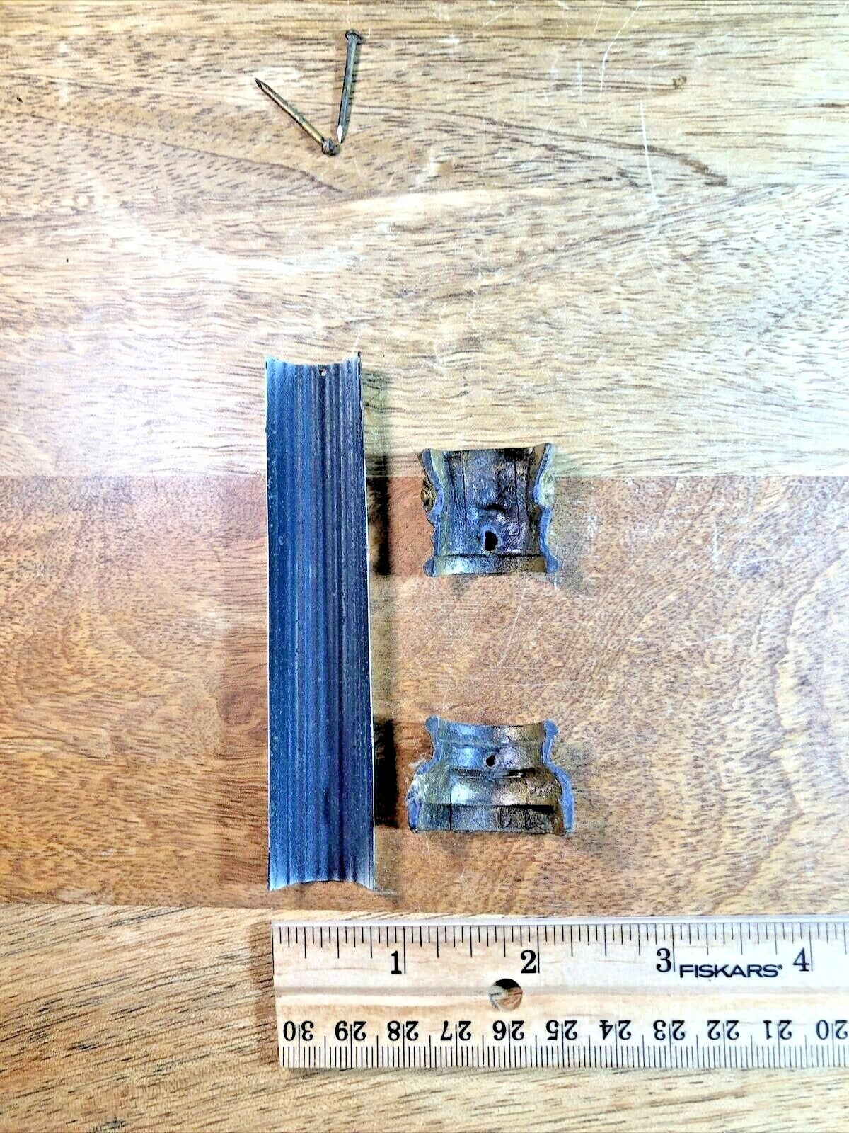 Old Black Mantel Clock Column 5 1/2 Inches Tall               (K7371)
