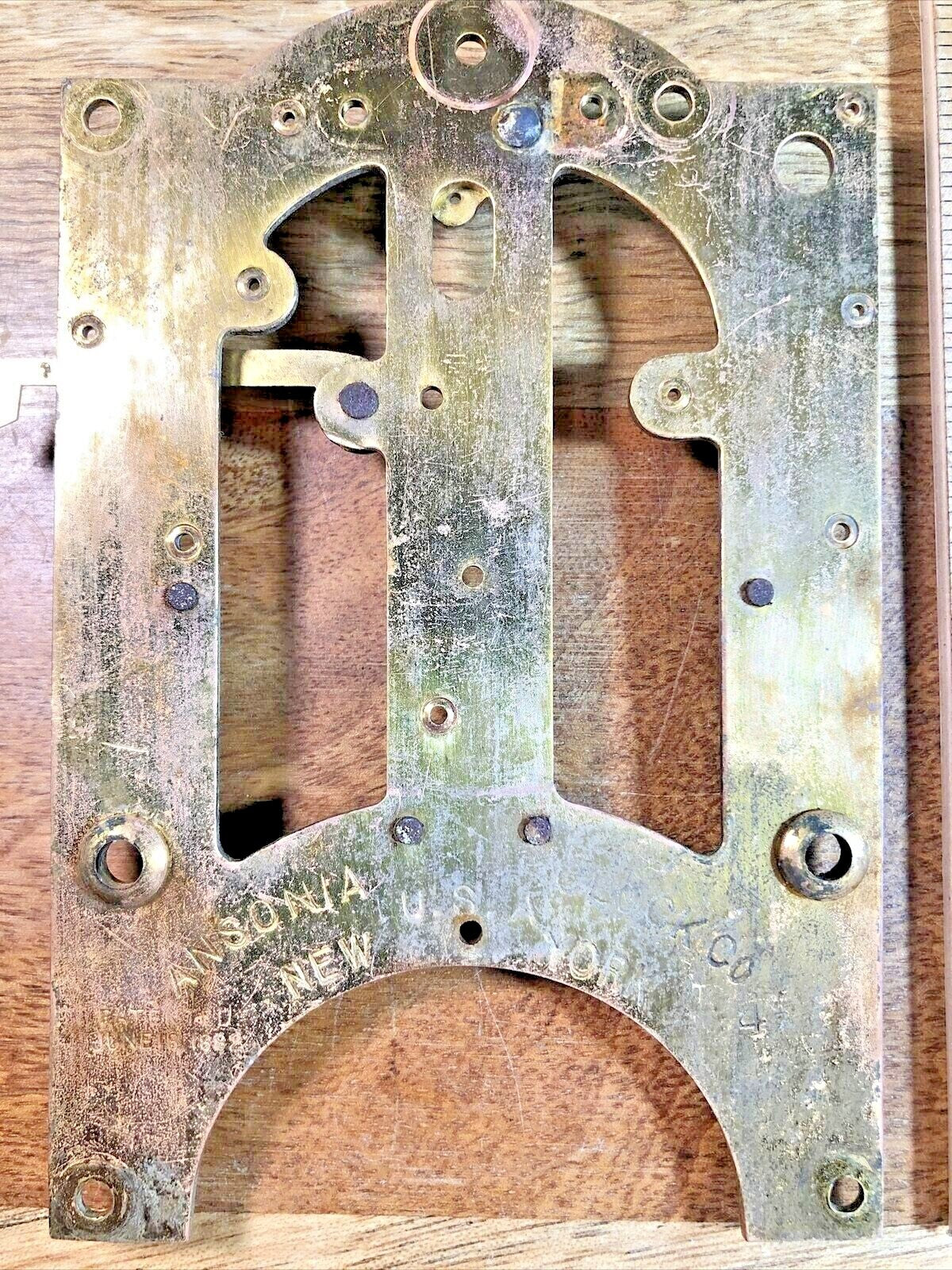 Old Ansonia Clock Movement Back Plate (Pivots Look Good)       (K7486)